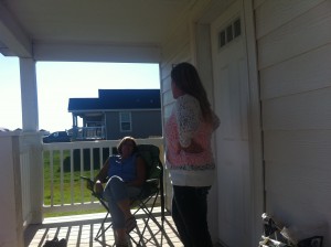 Rene and Shelly on front porch, Williston, ND.